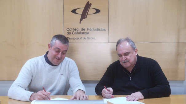 Marc Sureda i Jordi Grau, signant el conveni. 