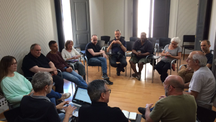 Els participants a la trobada amb fotoperiodistes de Girona.