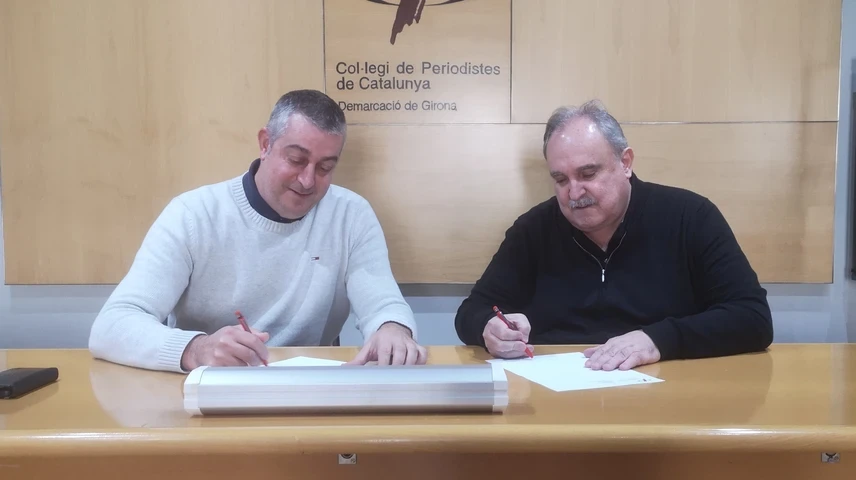 Marc Sureda i Jordi Grau, signant el conveni. 