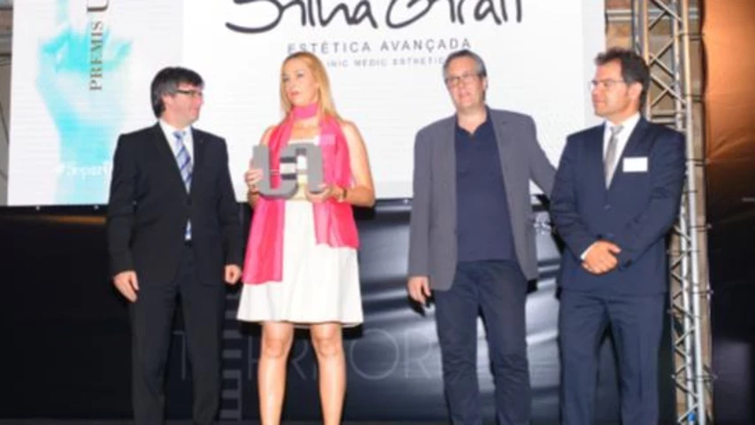 Carles Puigdemont amb Sílvia Giralt, Enric Badia i Blai Paco.