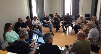 Els participants a la trobada amb fotoperiodistes de Girona.