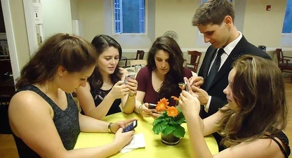 young-people-texting-smartphones-using-thumbs.jpg